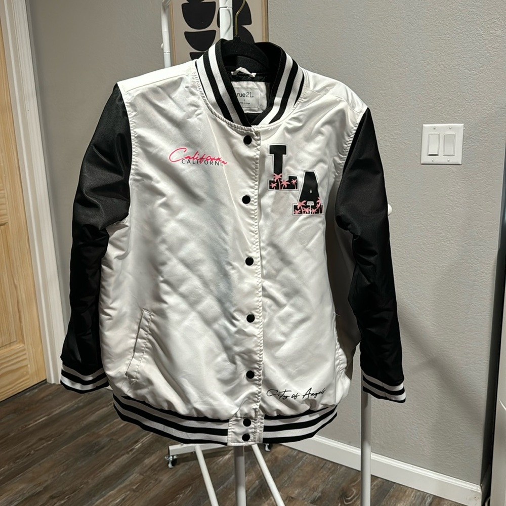 Rue21 women’s/juniors size Large bombers jacket.